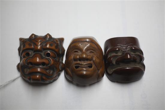 Three Japanese Meiji carved wood Noh mask netsukes, various, all signed